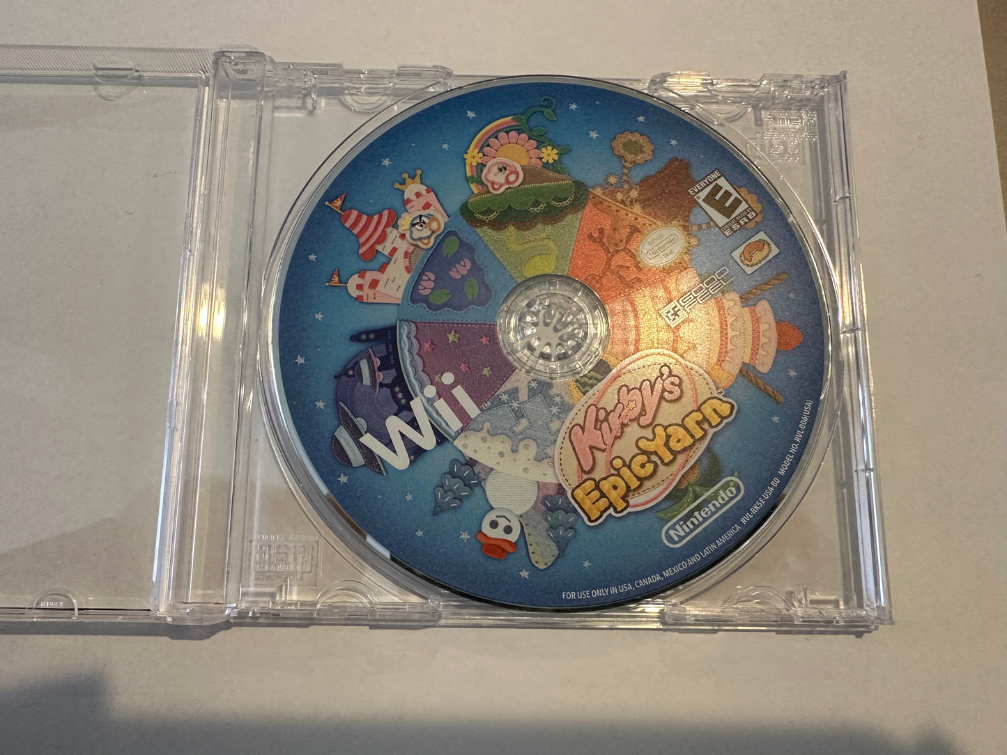 Kirby’s epic yarn for Wii. Disc only