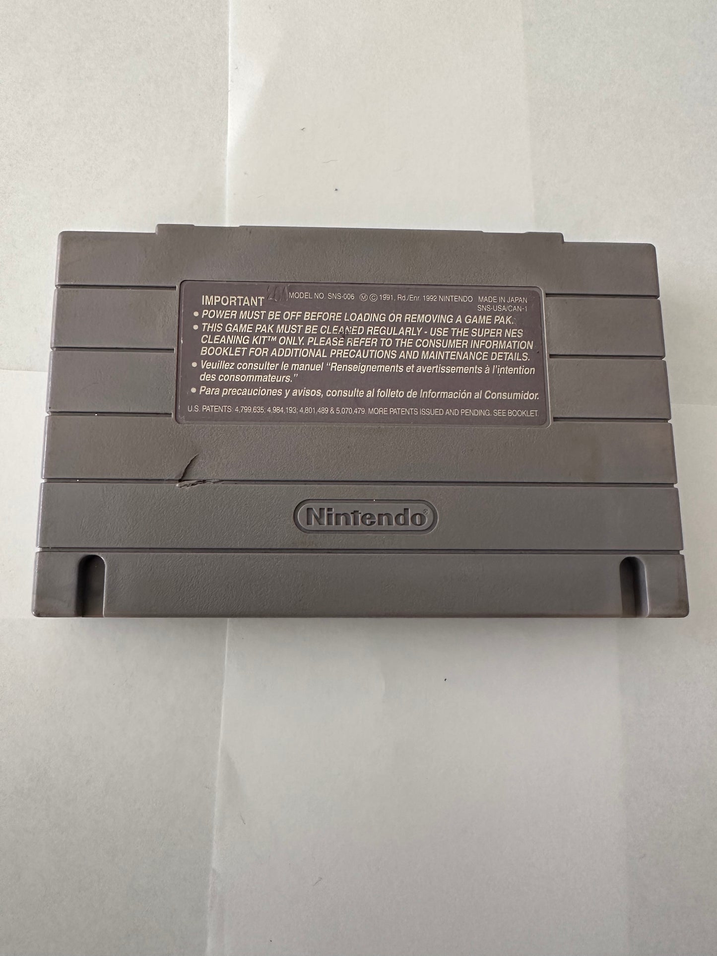 NBA jam for the Super Nintendo. Small crack on back of game.